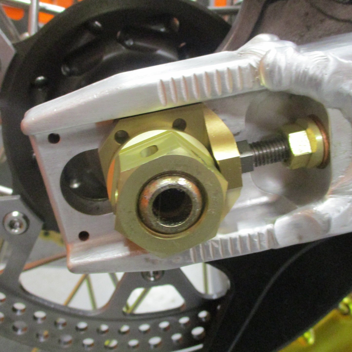 DocWob Billet Rear Axle Chain Adjuster Blocks – Suzuki RM125 / RM250 (2002–2008)