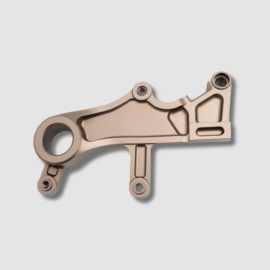 DocWob Bronze Billet Rear Brake Carrier – Honda CR125 / CR250 (2002–2007)