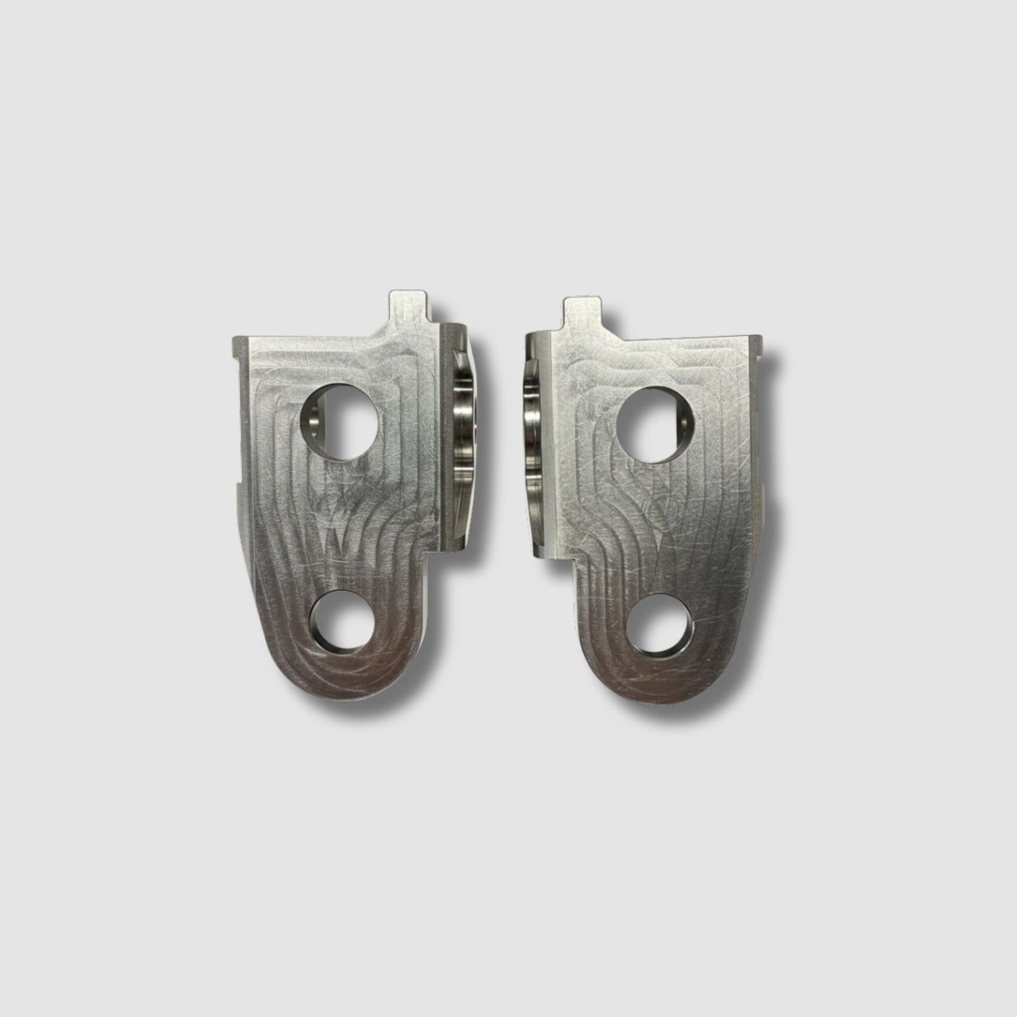 DocWob Titanium Footpeg Hanger Mounts – Honda CRF250 / CRF450 (2016–2025)