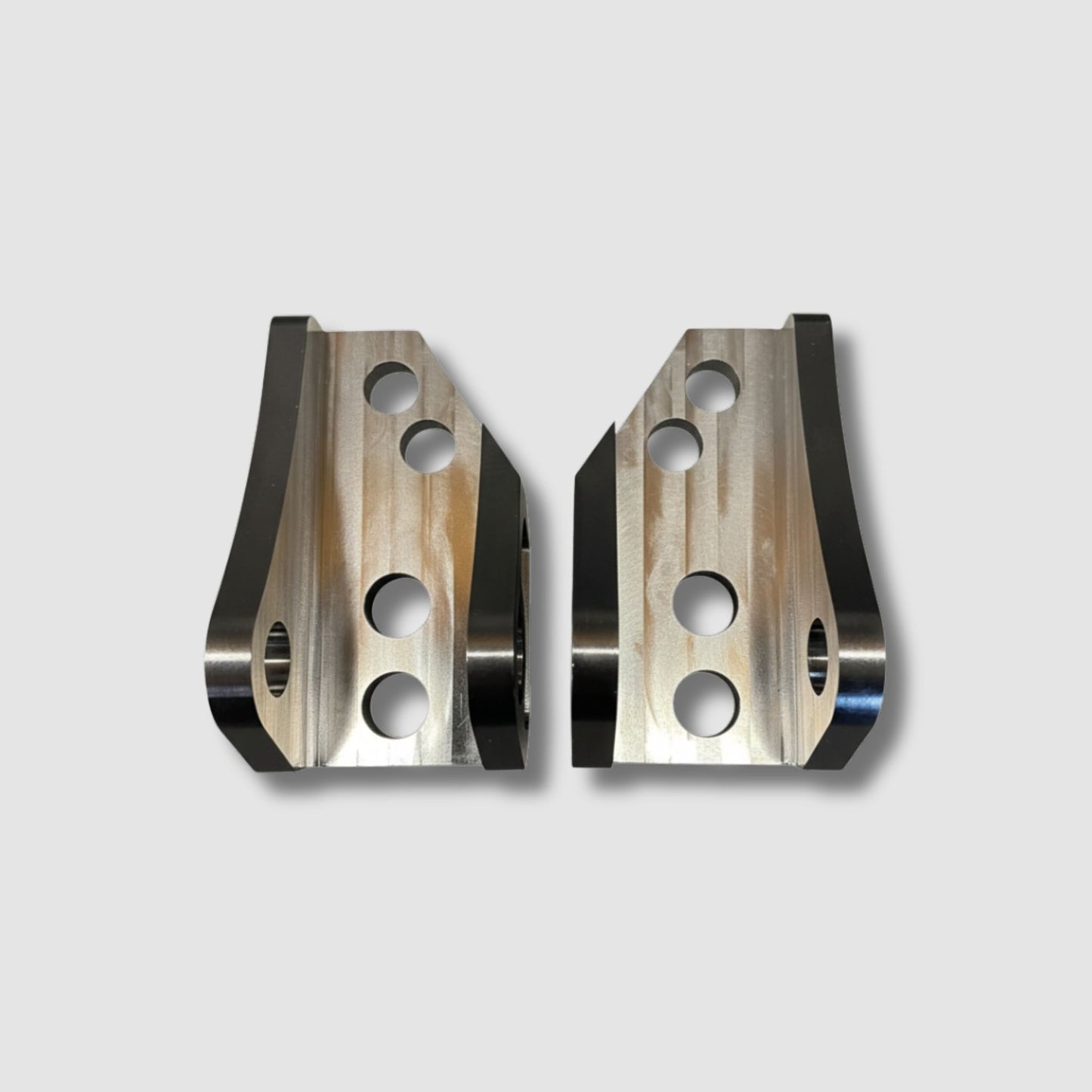DocWob Titanium Footpeg Hanger Mounts – Kawasaki KXF250 / KXF450 (2021–2025)