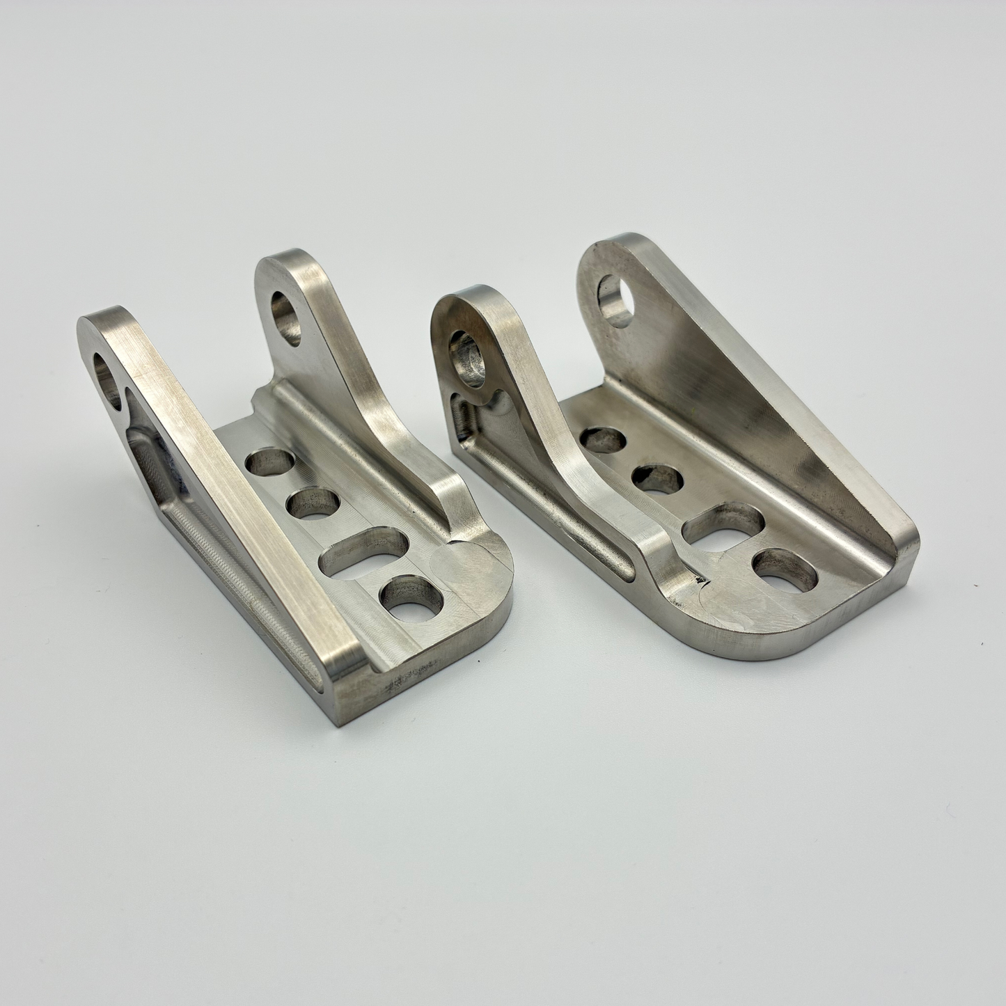 DocWob Titanium Footrest Hangers – Triumph TF450-RC TF450-X TF250