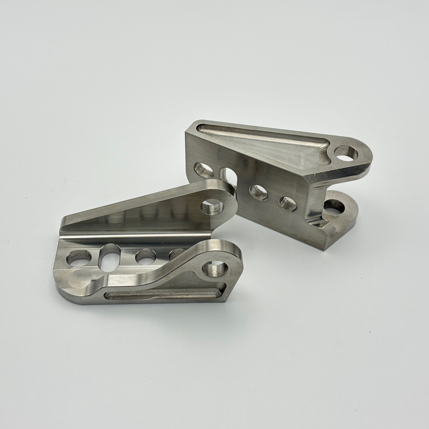 DocWob Titanium Footrest Hangers – Triumph TF450-RC TF450-X TF250