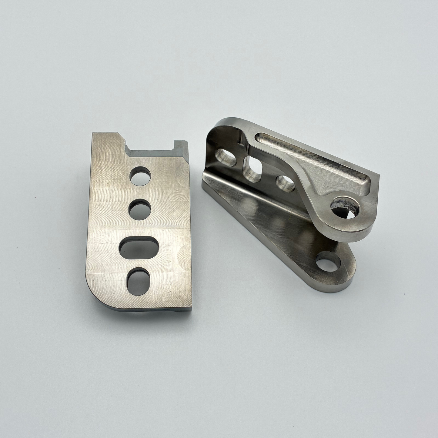 DocWob Titanium Footrest Hangers – Triumph TF450-RC TF450-X TF250